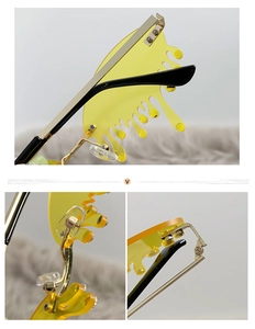 Détails des lunettes de soleil sans monture en forme de larme avec monture dorée