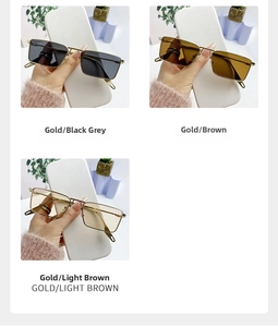 Detail view of gold metal sunglasses in black, brown, and light brown lens options