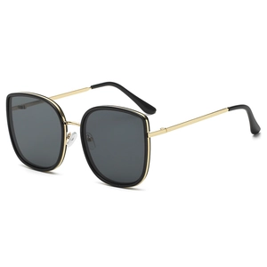 Fashion oversized sunglasses with black frame and gold metal temples in grey lens