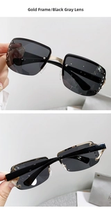 Detail of luxury half-frame sunglasses with crystal-embellished lenses and gold temples