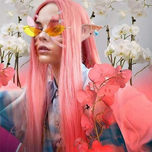 Detail of rimless dragonfly wing sunglasses with pink wig and elf ears for cosplay costume