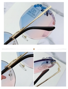 Detailed macro view of rimless sunglasses with gradient lenses and crystal rhinestones