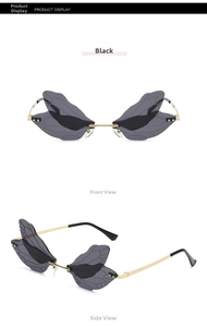 Macro detail of rimless dragonfly wing sunglasses with grey tinted lenses and gold metal arms