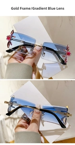 Detail of square gradient blue sunglasses with gold metal temples and crystal flower accents