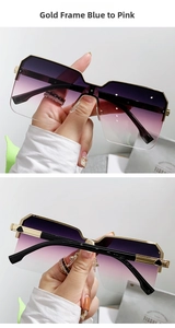 Dettaglio di occhiali da sole oversize con montatura dorata e lenti sfumate blu-rosa