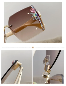 Detail of rimless gradient sunglasses with luxury rhinestone inlay and metal hinges