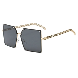 Oversized square sunglasses with gold chain temples and silver rivet lens details