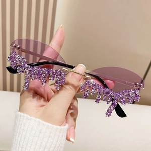 Fashion rimless sunglasses with purple lenses and shimmering crystal fringe tassels