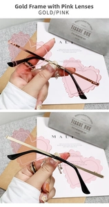 Detail of rimless heart sunglasses with wave-cut pink lenses and thin gold metal frames