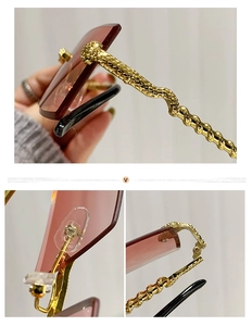 Detail of gold snake-shaped metal temples and tinted lenses on rimless sunglasses
