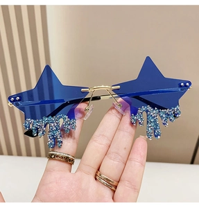 Detail of blue star-shaped rimless sunglasses with dangling rhinestone tassel charms