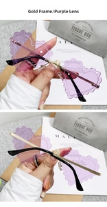 Detail of scalloped heart-shaped purple lenses with sleek gold metal frames and hinges