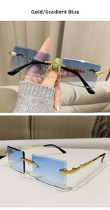 Detail of snake-textured gold metal temples and gradient blue rimless lenses for sunglasses