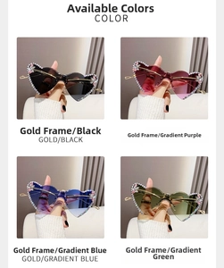 Detail of four colorful rimless heart sunglasses with crystal rhinestones on gold frames