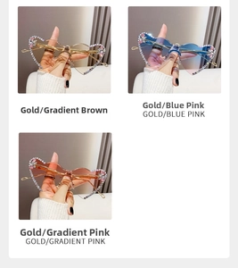 Close-up of heart rimless sunglasses featuring luxury rhinestone floral edges and tinted lenses