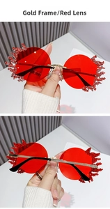 Détail de lunettes de soleil flamme sans monture avec cadre doré et verres rouges