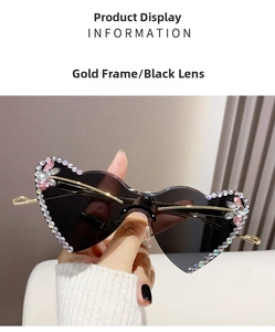 Detail of heart-shaped rimless sunglasses with rhinestone trim and gold metal temples