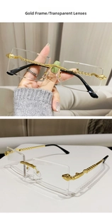 Close-up of golden metal temples with spiral relief texture on rimless sunglasses