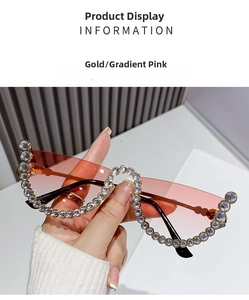 Detail of gold half-frame sunglasses with gradient pink lenses and rhinestone trim