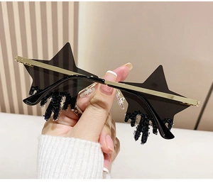 Star-shaped rimless sunglasses with dangling crystal droplet details and gold metal arms