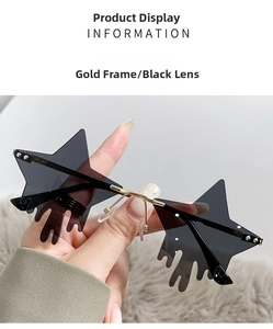 Detail of star-shaped rimless sunglasses with gold frames and unique liquid drip lens design