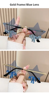 Close-up of star-shaped rimless sunglasses with blue lenses and dripping crystal tassels