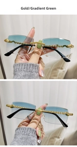Detail of snake textured gold metal temples and gradient green rimless sunglasses lenses