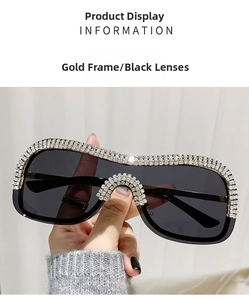 Détail de lunettes de soleil dorées avec verres gris-noir et cristaux strass de luxe