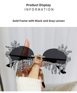 Detail of gold frame rimless teardrop sunglasses with rhinestones and grey lenses