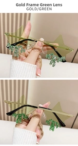 Detailed view of rimless star-shaped sunglasses with green rhinestones and gold metal frame