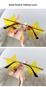Close-up of gold star sunglasses with yellow lenses and unique melting drop detail