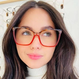 Detailed close-up of fashion cat-eye TR90 glasses frames with red-brown tortoise finish