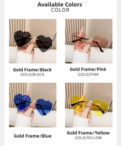 Detailansicht der herzförmigen randlosen Sonnenbrille mit Strasssteinen in vier Farben
