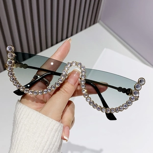 Modern wavy half-frame sunglasses with crystal rhinestones and grey gradient lenses