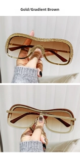 Vue détaillée des lunettes de soleil dorées avec strass et verres dégradés bruns