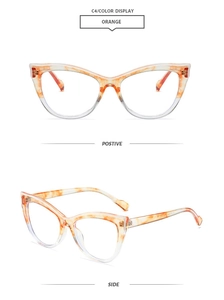 Detail view of cat eye frame in orange marble and clear finish with side perspective