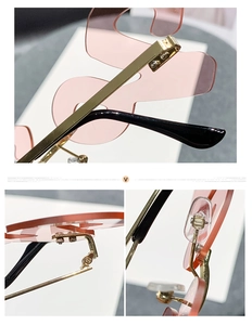 Macro detail of 2024 rimless sunglasses showing metal hinges and pink gradient lenses