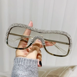 Lunettes de soleil punk sans monture avec strass brillants et branches transparentes