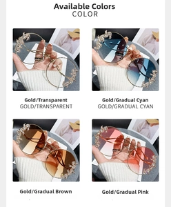 Detail of rimless sunglasses with gold dragon temples and sparkling rhinestones