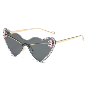 Fashionable heart-shaped rimless sunglasses with grey gradient lenses and rhinestone accents