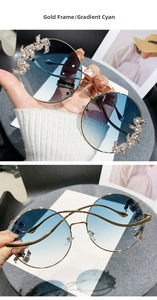 Detail of rimless blue gradient sunglasses with luxury rhinestone dragon decoration