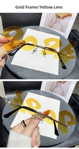 Macro view of gold 2024 novelty sunglasses with yellow lenses and thin metal frame