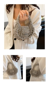 Detailed macro view of silver metallic beaded woven handbag with elegant pearl texture