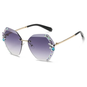 Lunettes de soleil sans monture avec verres dégradés violets et strass brillants