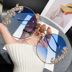 Rimless gradient blue oversized sunglasses with gold diamond-set filigree and metal frame