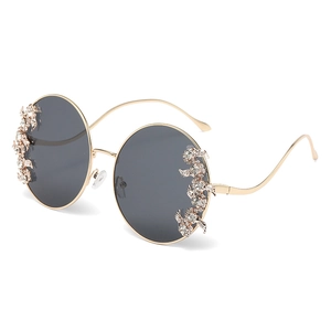 Fashionable rimless oversized round sunglasses with crystal rhinestones and gold metal temples