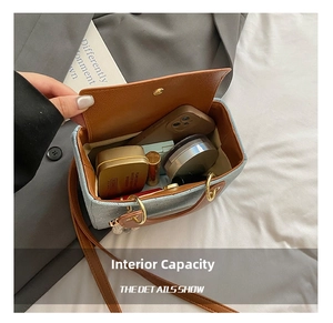 Macro view showing the internal capacity of the denim crossbody bag with daily essentials