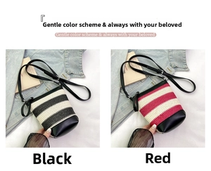 Detail view of woven bucket bags with black leather base in black and red stripes