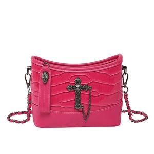Rose red shoulder bag with crocodile texture, metal cross and skull chain charms