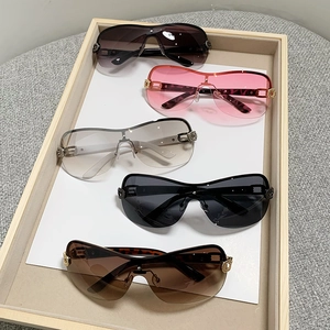 Detailed view of Y2K shield sunglasses in five gradient colors with metallic accents